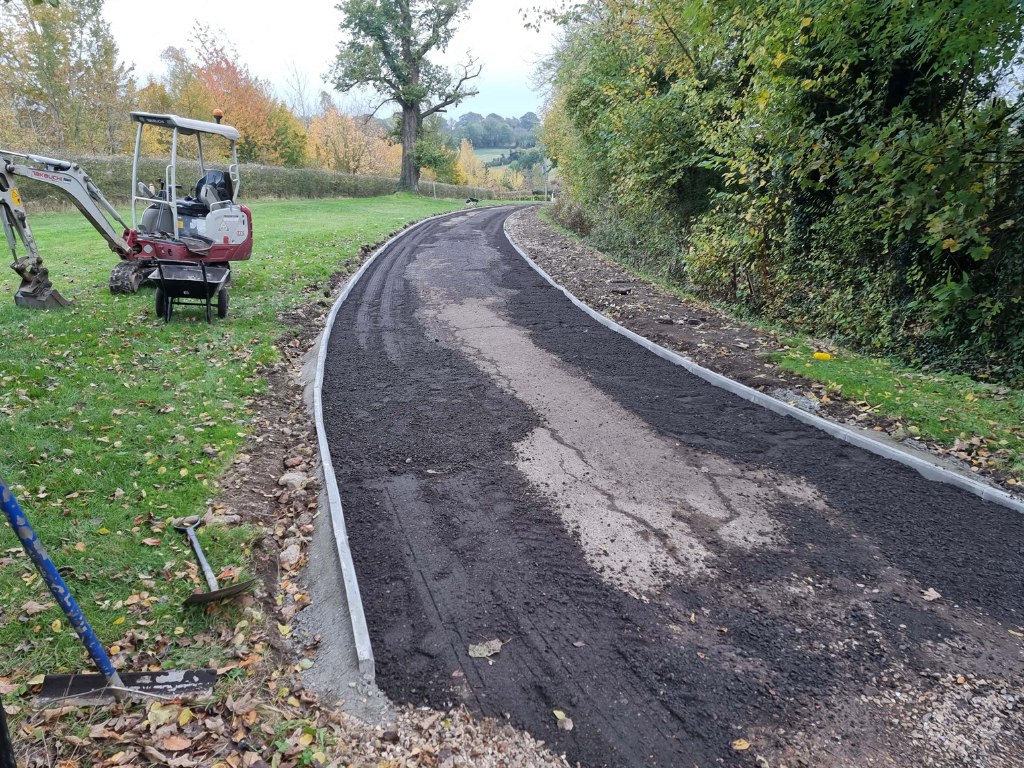 This is a large driveway which is in the process of having a tar and chip driveway installed on by Gravesend Driveways