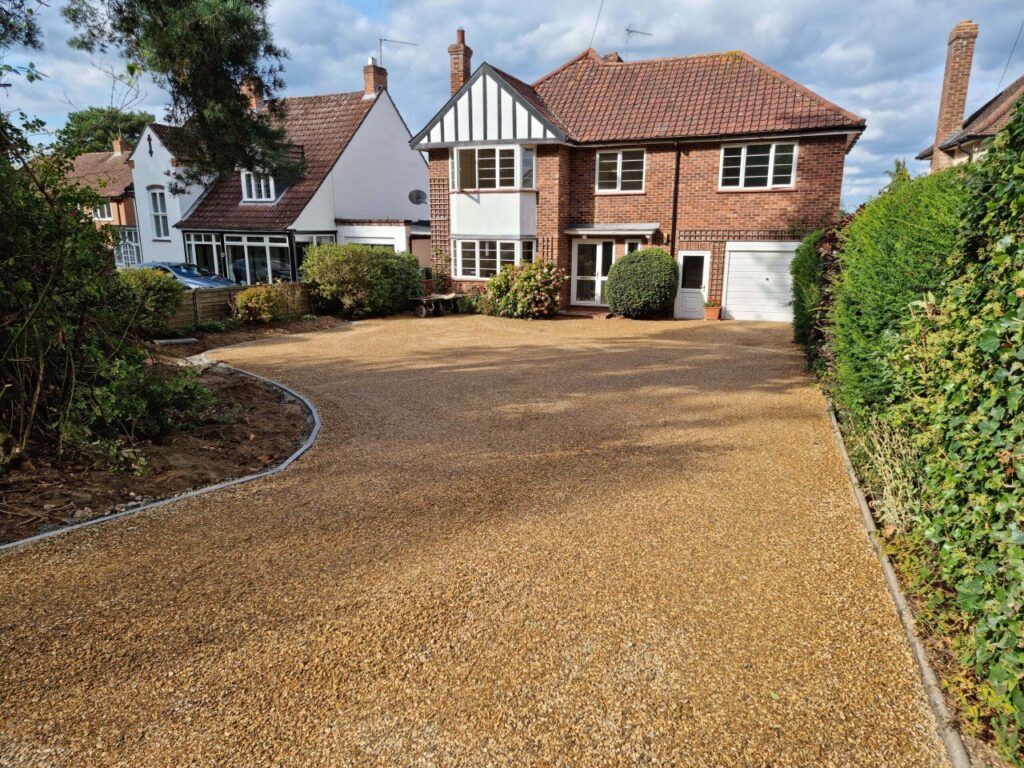 This is a newly installed tar and chip driveway installed by Gravesend Driveways
